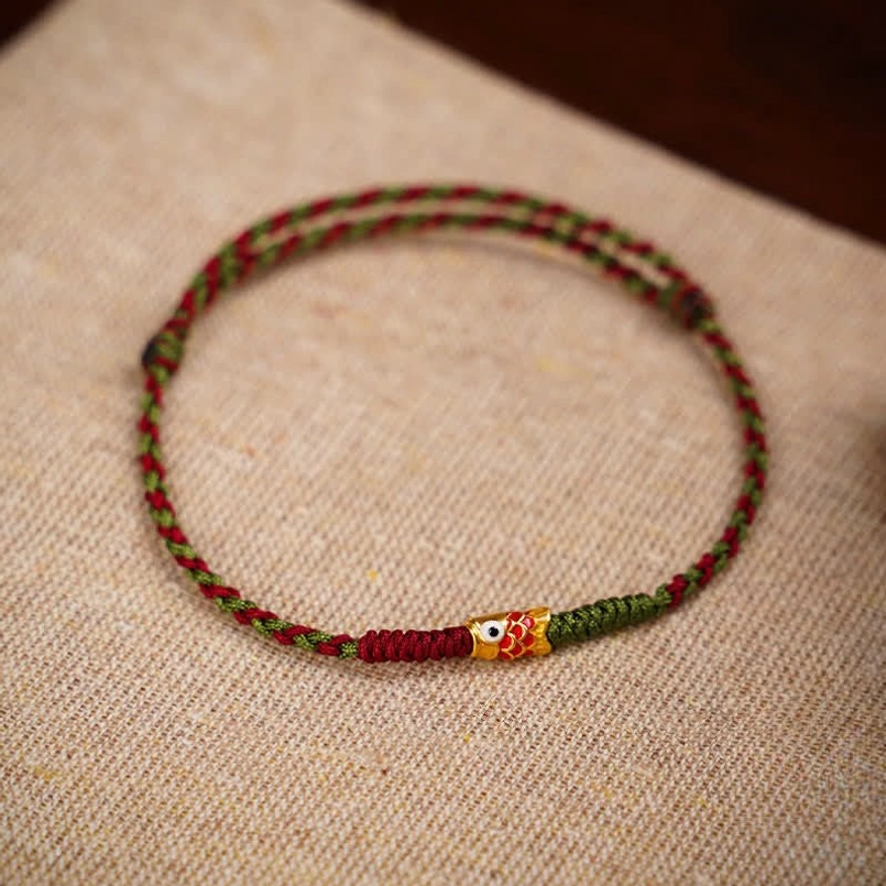 Red koi fish braided lucky string bracelet with gold charm detail