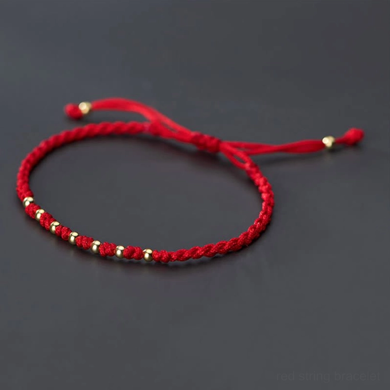 Red string beaded bracelet adjustable tie ends with gold plated silver accents