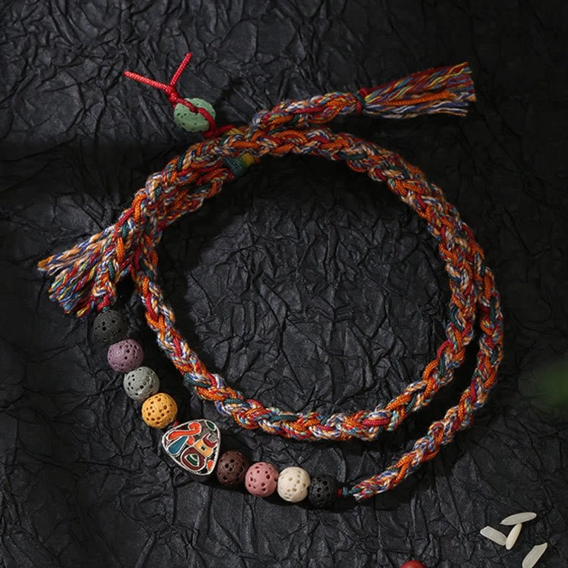 Red rope Dragon Boat Festival lucky braided bracelet flat lay