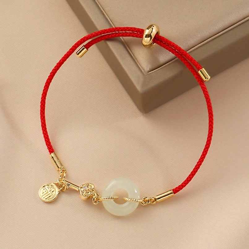 Adjustable red rope luck bracelet with Fu pendant jade peace buckle and cord end beads