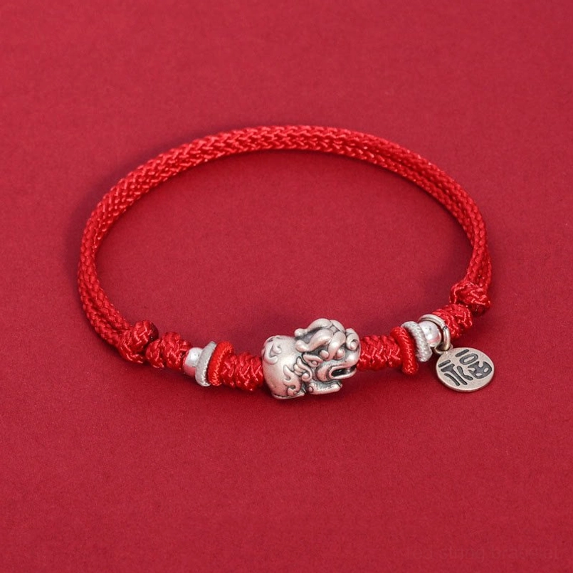 Red rope Pixiu Fu wealth sterling silver bracelet - flat lay front view
