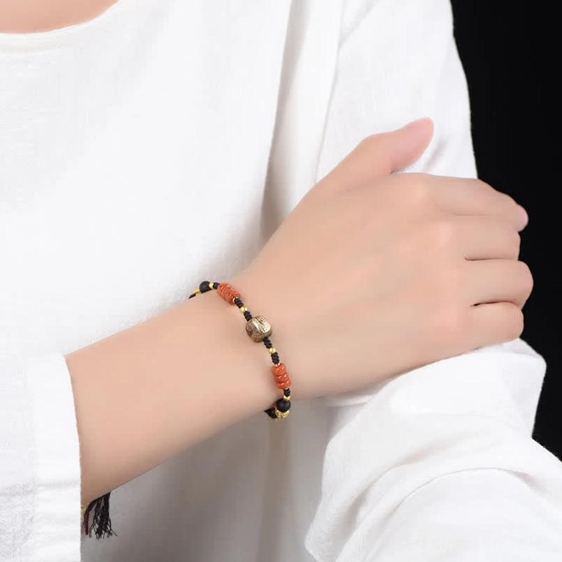 Red sandalwood blessing protection bracelet handmade artisan craft with natural agate accents and adjustable cord