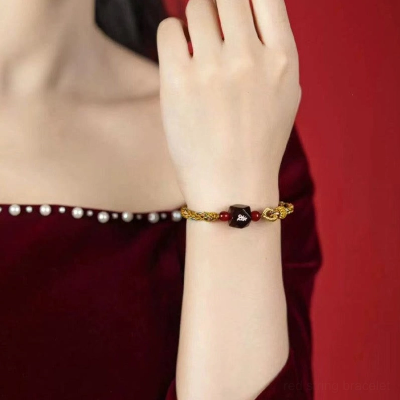 Close Up Wrist Shot Of Red Sandalwood Red String Bracelet