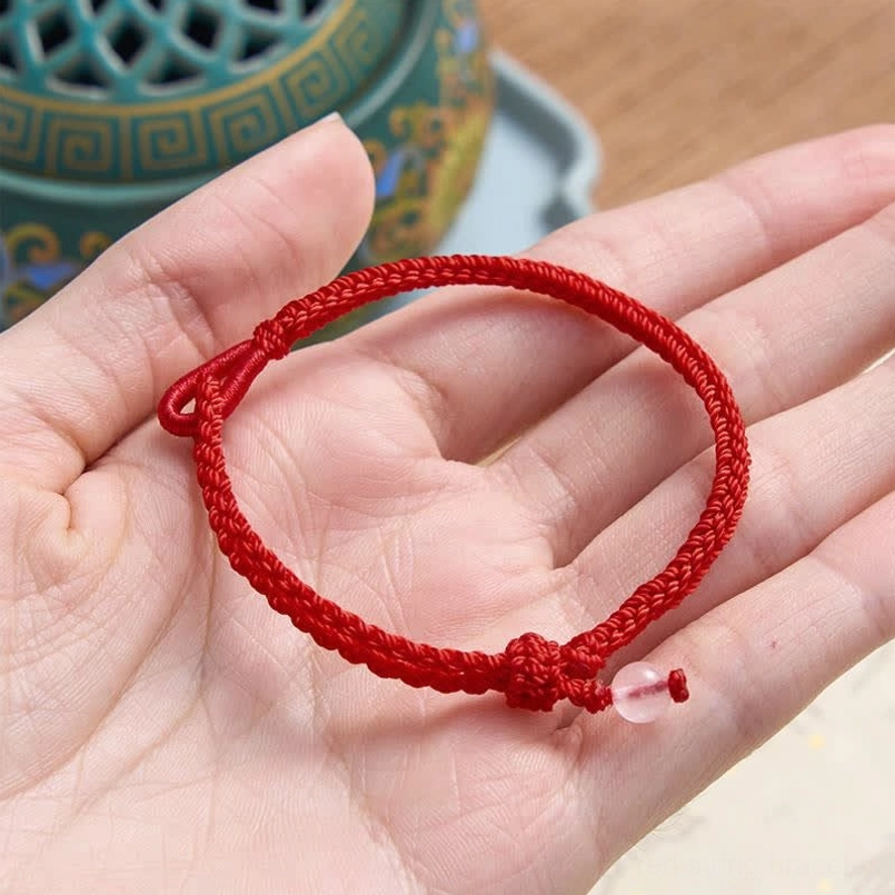 Green aventurine and rose quartz red string balance bracelet size comparison