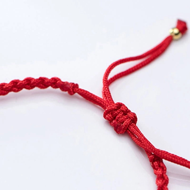 Red braided cord bracelet adjustable fit with silver and gold plated beads
