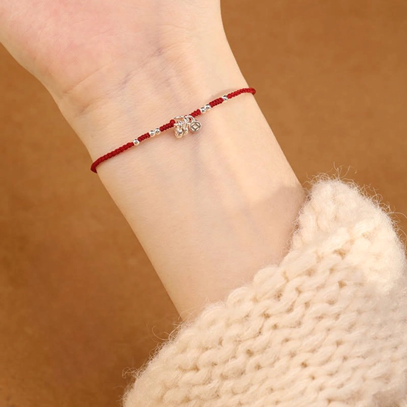 Red string bracelet and anklet versatile design showing adjustable fit and spiritual symbolism