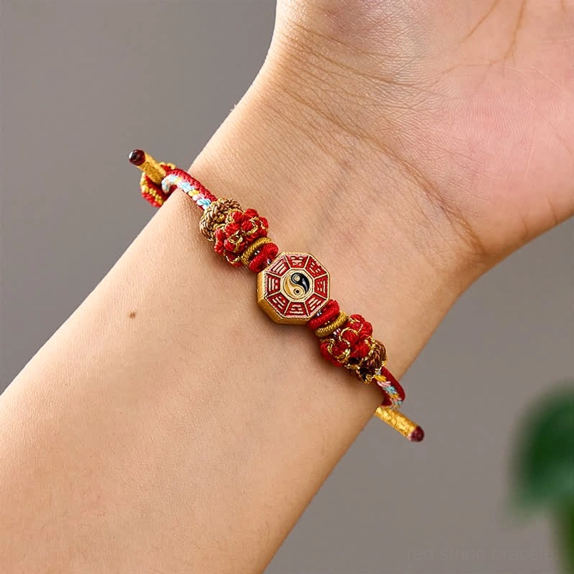 Red string Bagua protection bracelet worn on wrist lifestyle wear display
