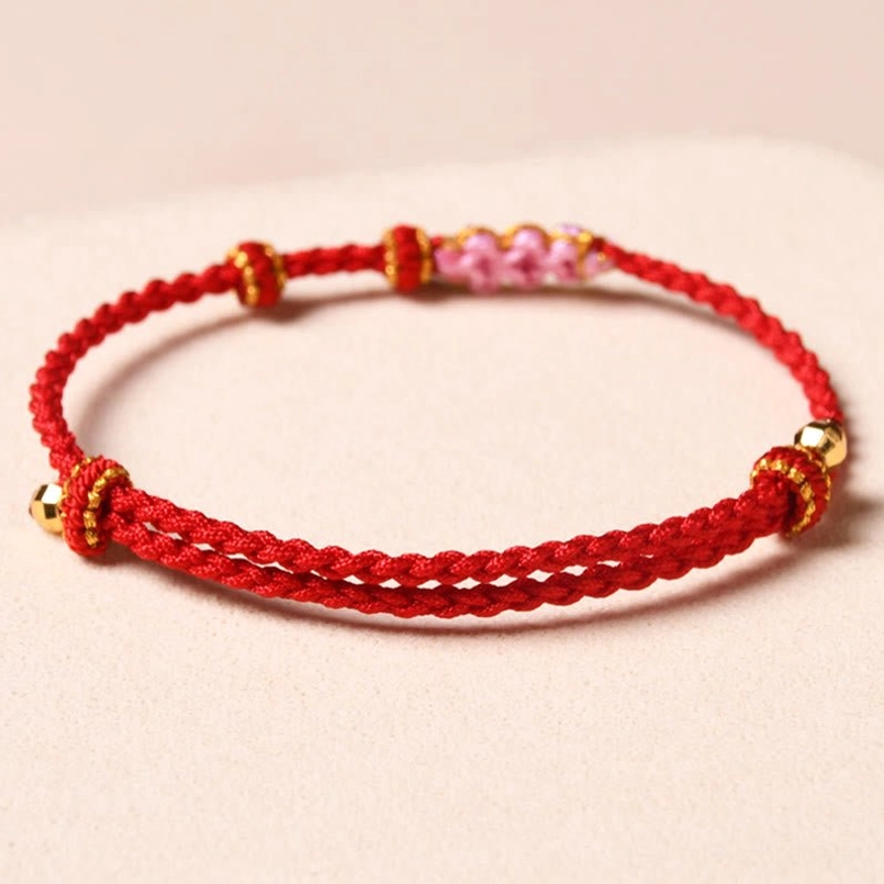 Red string peach blossom bracelet - black color variant wrist wear