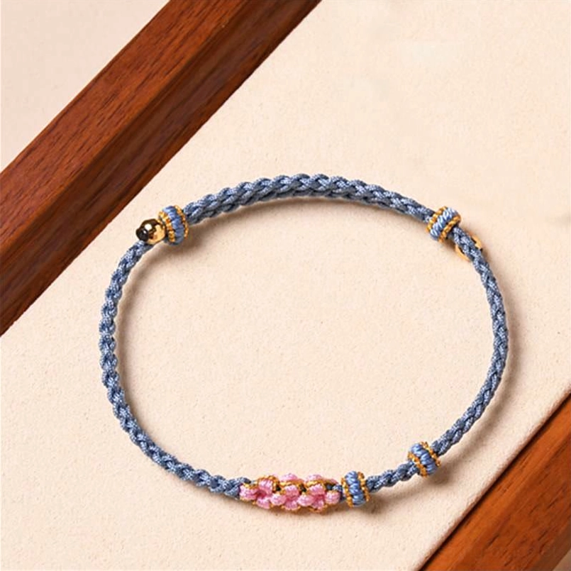 Blue peach blossom red string protection bracelet handcrafted floral design