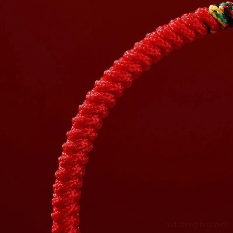 Close up texture of twisted braided red string for zodiac horse bracelet