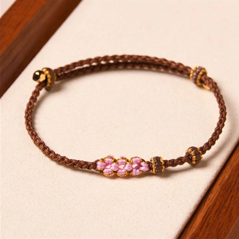 Brown peach blossom red string protection bracelet handmade artisanal