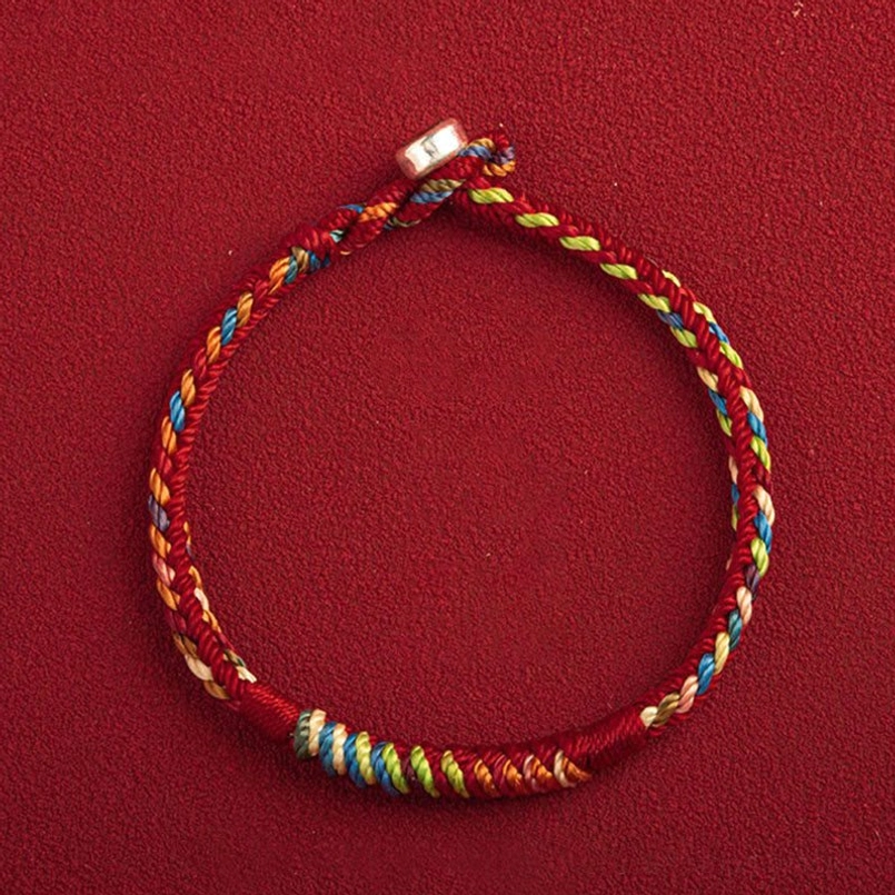 Red five color thread king kong knot bracelet wearable lifestyle shot