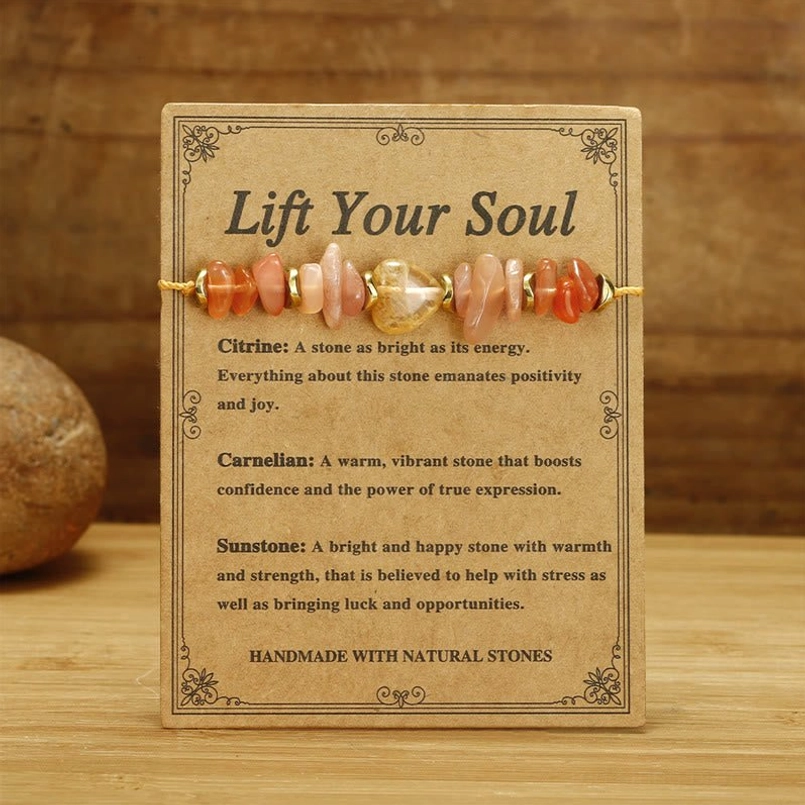 Handmade red string prosperity bracelet flat lay with wooden background and product info card