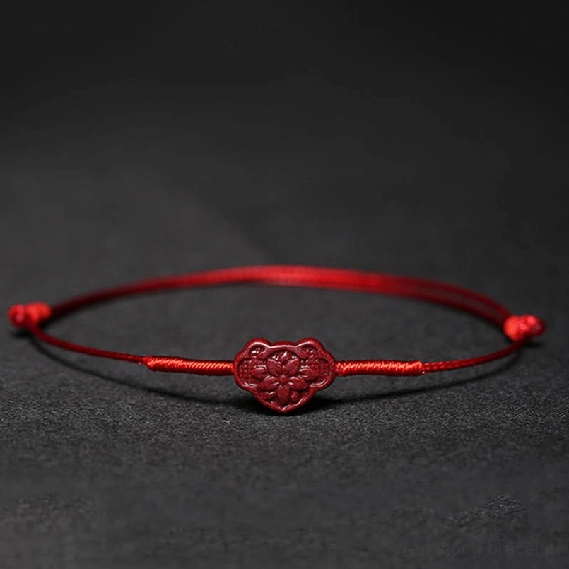 Red string bracelet with lock of good wishes charm design
