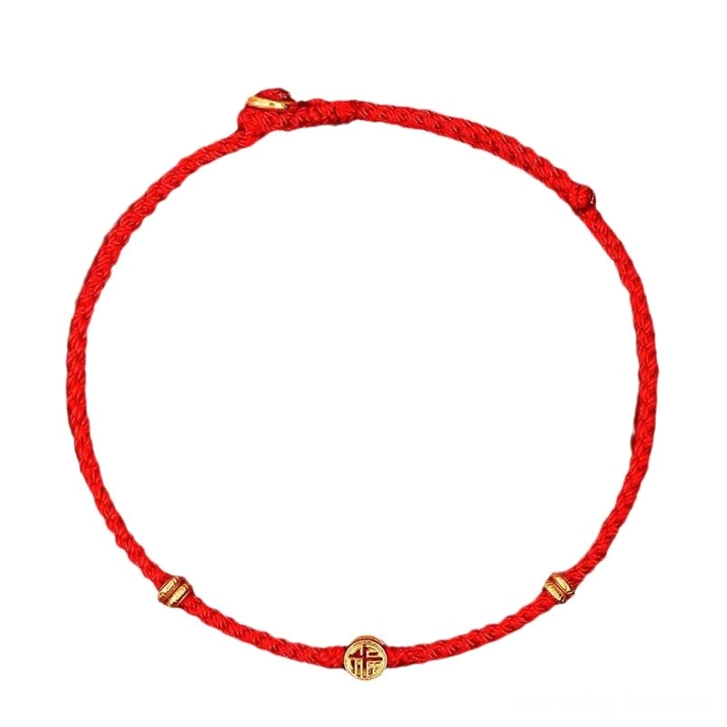 Red string luck bracelet worn on male wrist casual daily shot