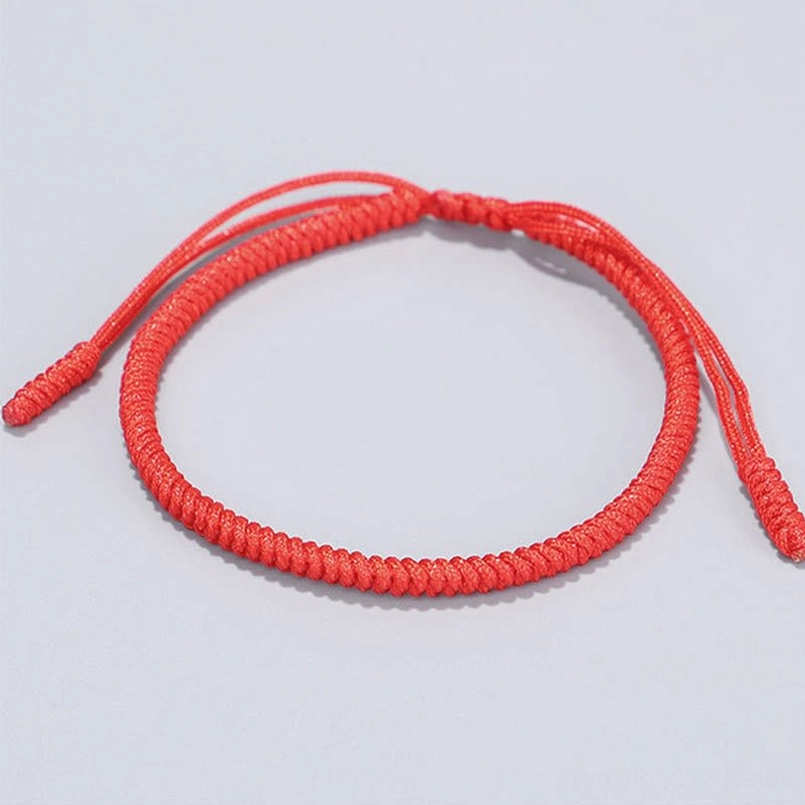 Plain red woven string bracelet with sliding knot adjustment