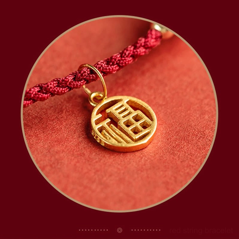 Red string bracelet fortune charm pearl and agate combination on neutral background product shot