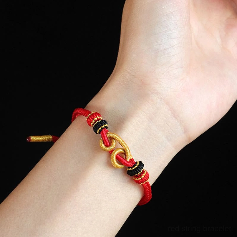 Red Braided Ingot Bracelet Worn On Wrist Side Close Up