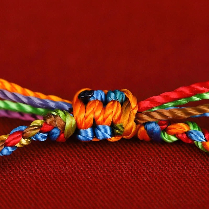 Two styles of multicolored woven bracelets showing adjustable sliding knot and closed loop braid options