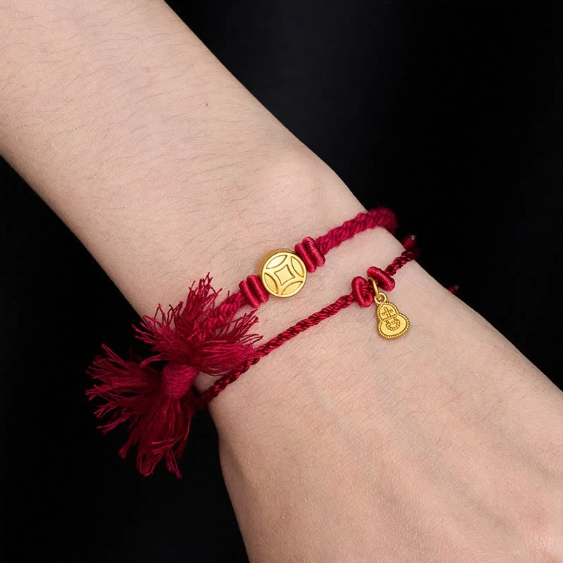 Double Strand Red String Bracelet Worn on Wrist Side View Lucky Wealth Charm