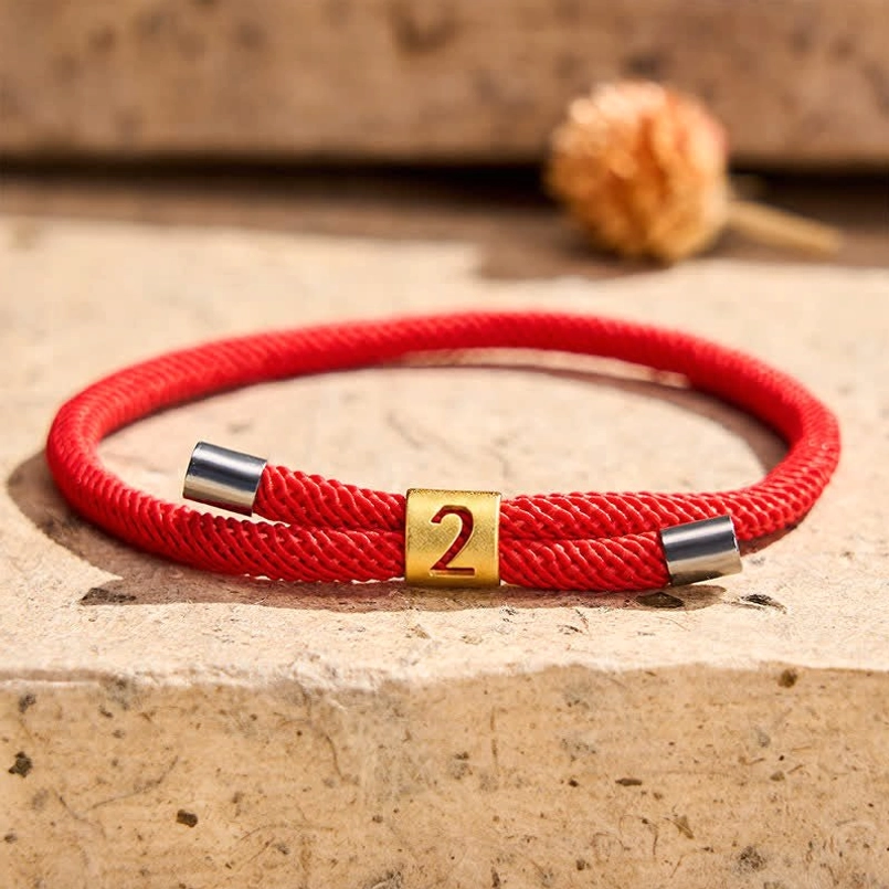 Red string adjustable bracelet wrist fit demonstration