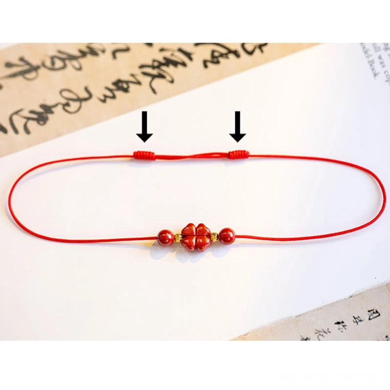 Red string bracelet with cinnabar charm wrist stack styling multiple bracelets
