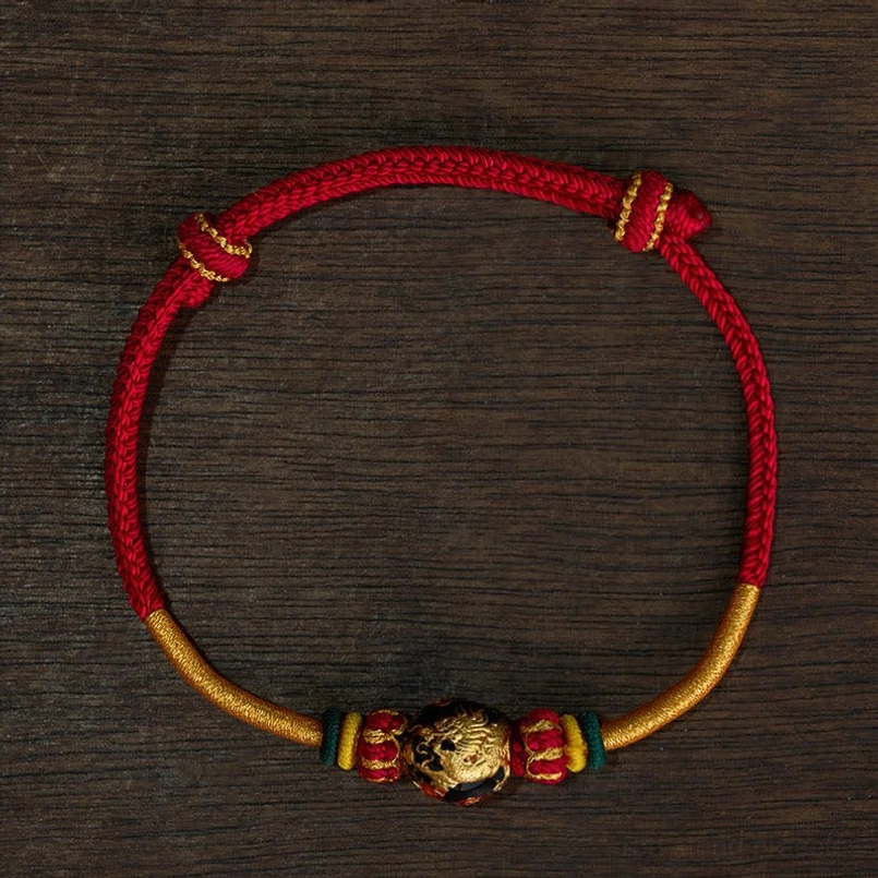 Red string dragon bead bracelet in traditional Tibetan Buddhism style