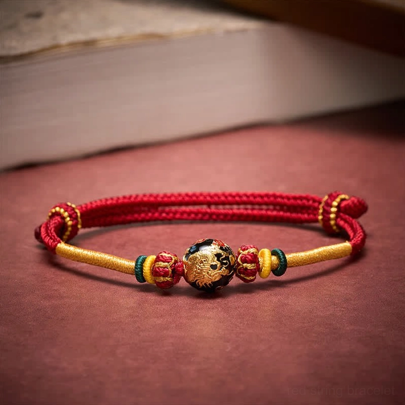 Multi-color woven red string dragon bead bracelet with decorative knots