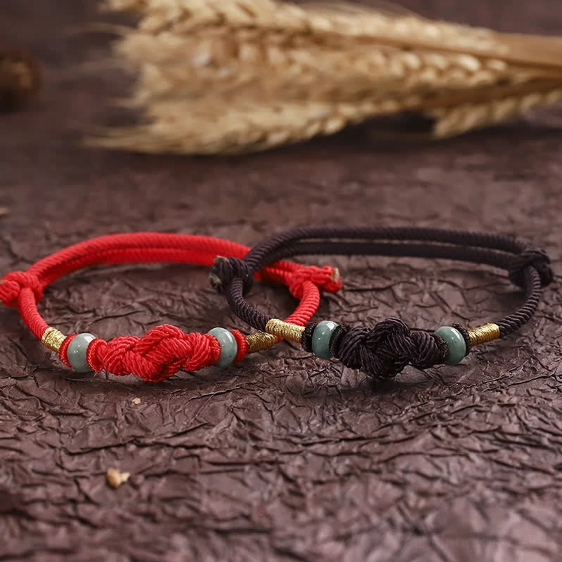 Red string fortune knot bracelet with adjustable sizing