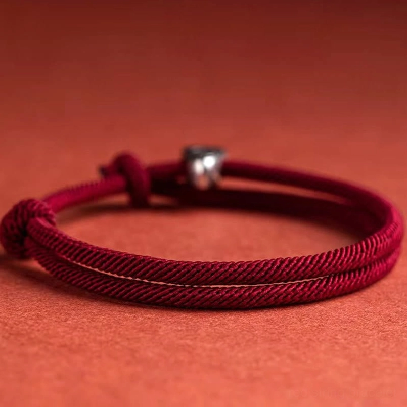 Wine red braided red string bracelet with silver fu charm round bead
