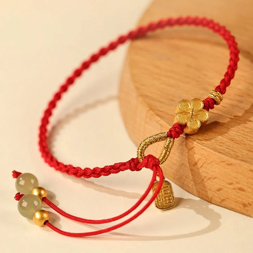 Red braided Hetian jade red string bracelet side view with adjustable clasp