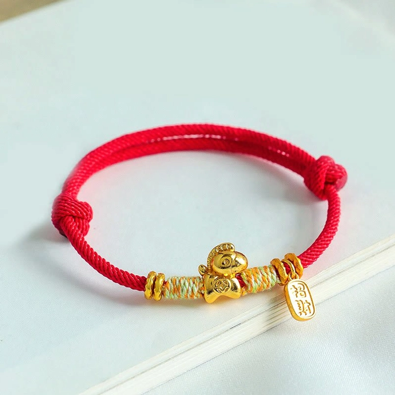 Adjustable red string zodiac horse bracelet with fortune pendant close up view