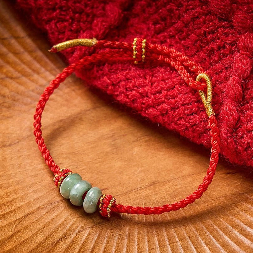 Red string jade protection bracelet gold tone fasteners copper alloy hardware