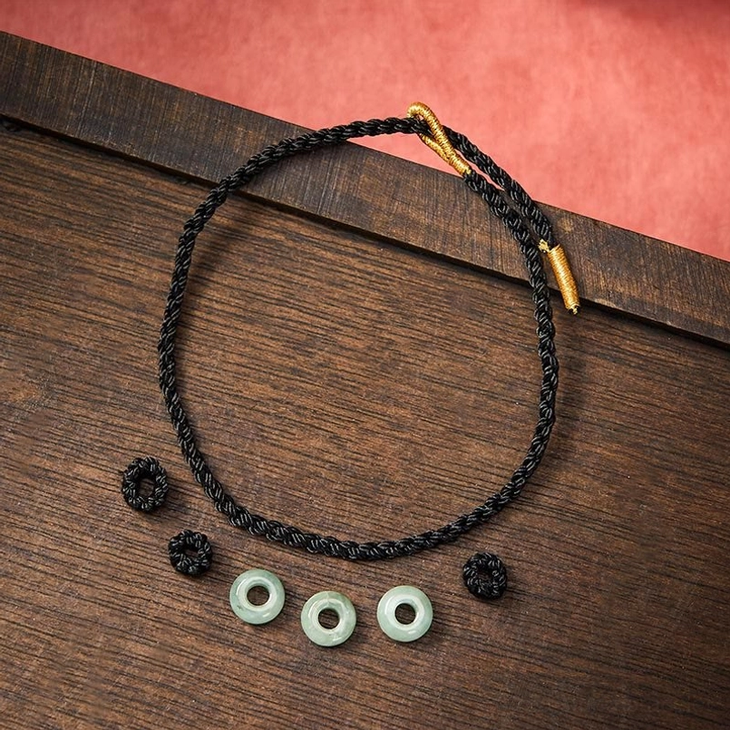 Red string jade bracelet handmade craftsmanship artisan quality detail