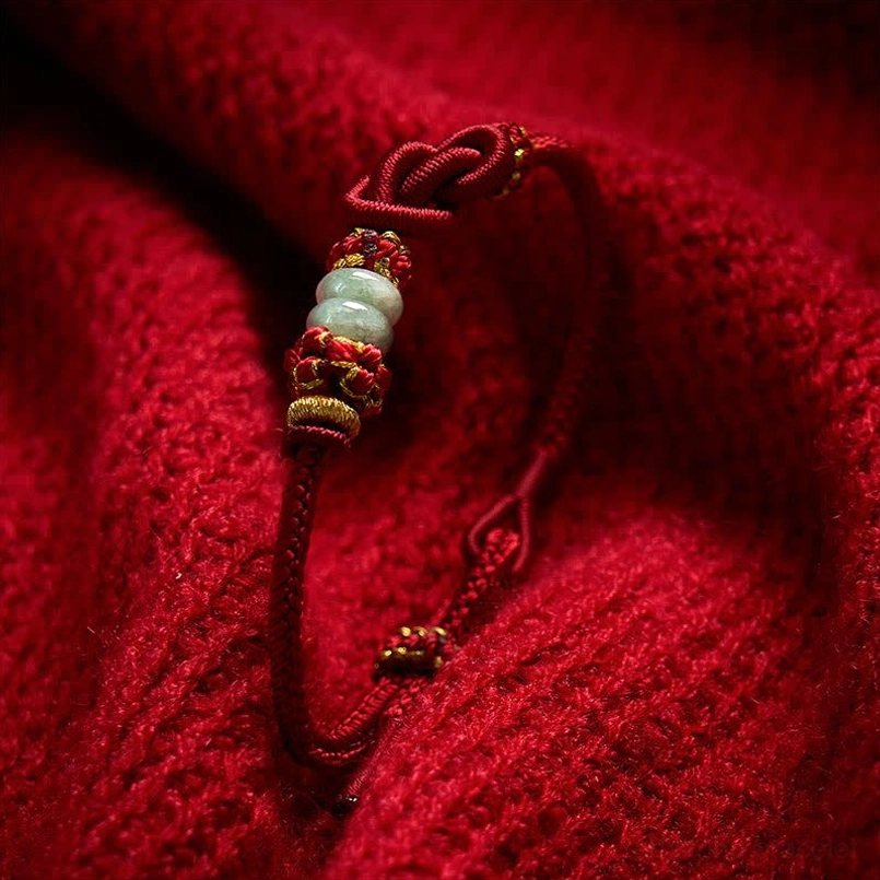 Luck and protection red string jade bracelet product photography