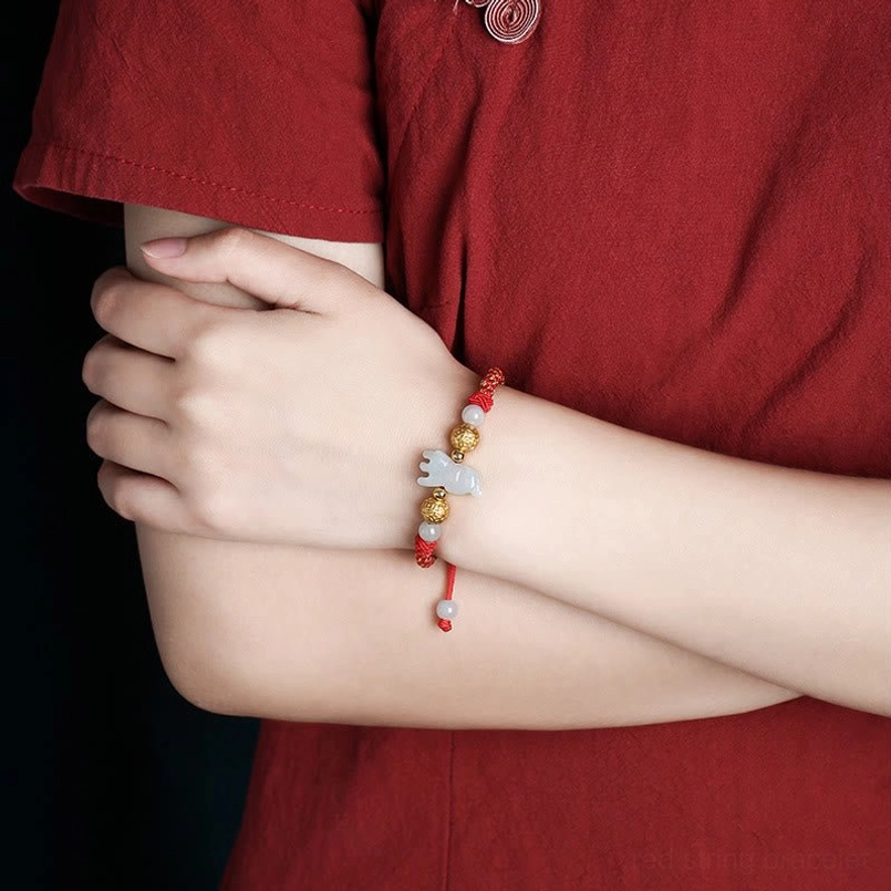 Red string bracelet jade charm sterling silver beads adjustable knot