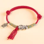 999 sterling silver red string koi fish protection bracelet flat lay front view