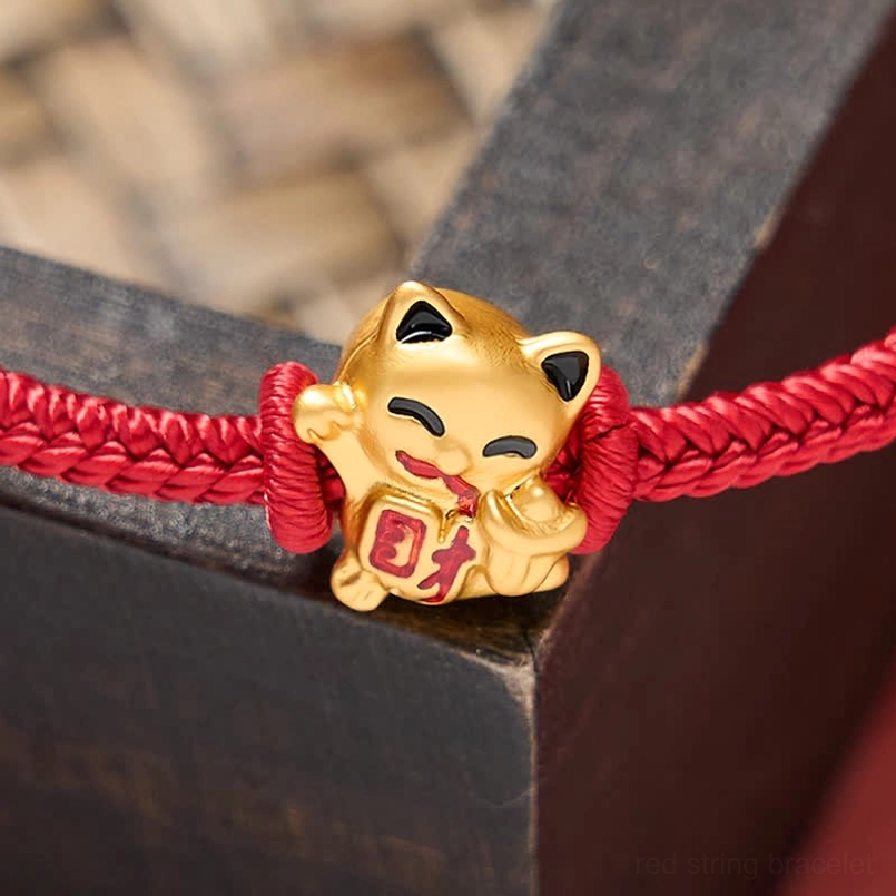Complete red string lucky cat bracelet collection showing versatile wear and prosperity symbolism