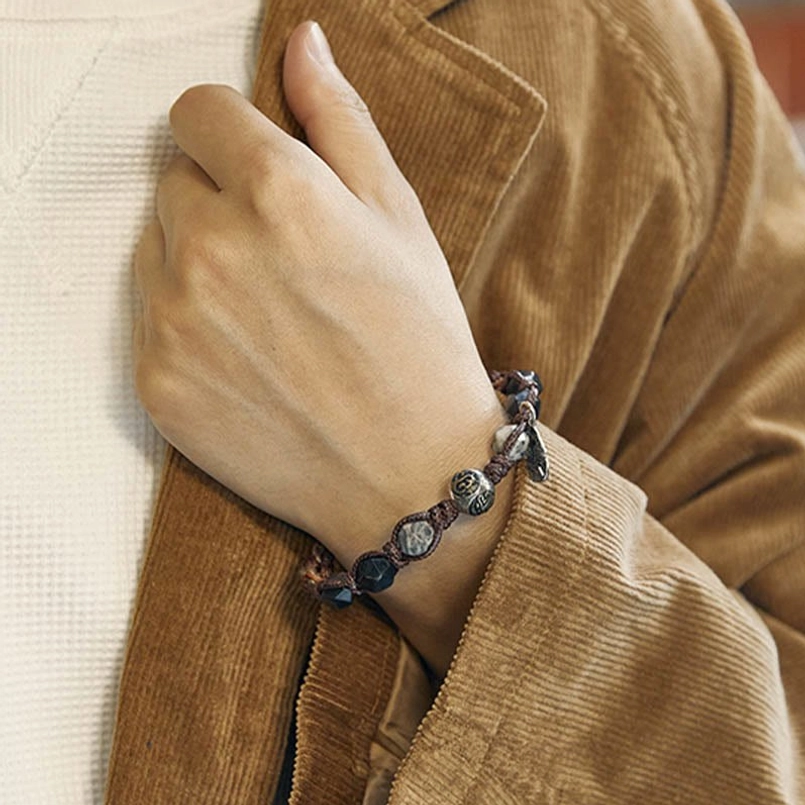 real wearing effect of 925 silver feather red string obsidian bracelet on wrist