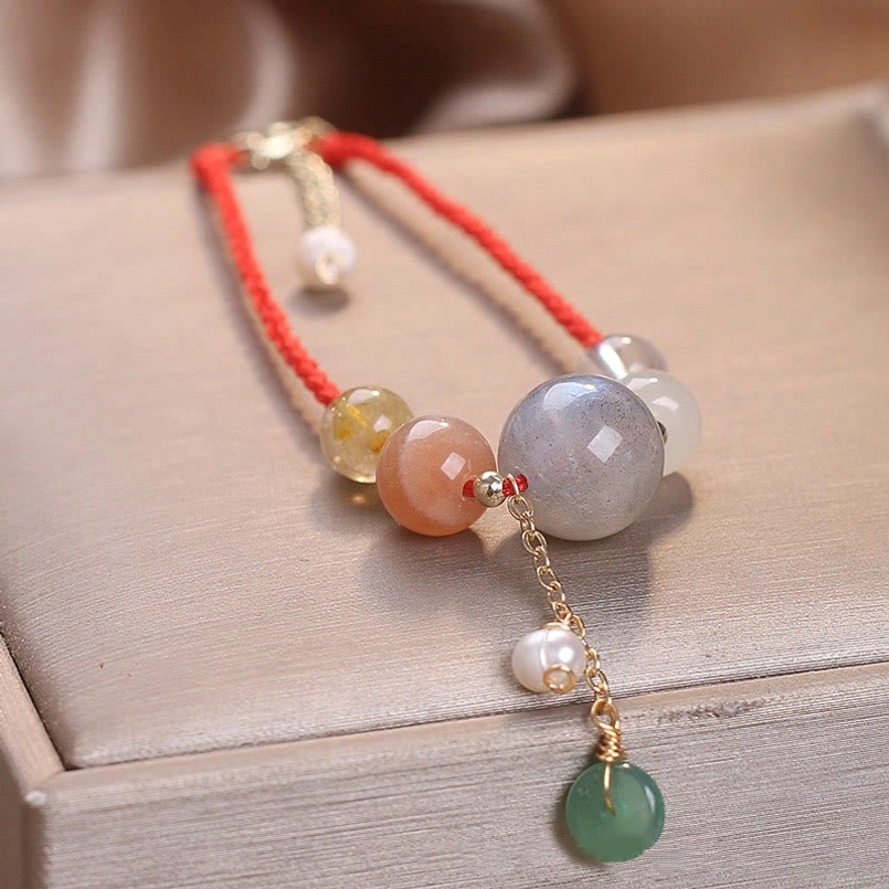 Red string peace buckle moonstone bracelet with braided rope and delicate gold chain tassel