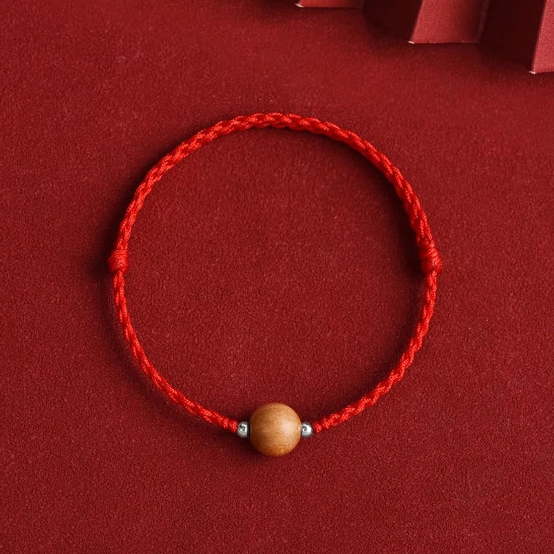 Red string bracelet with natural peach wood bead - traditional spiritual protection accessory