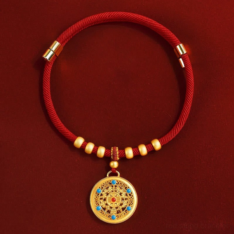 Minimalist red string pet collar with small gold beads and round carved compass pendant