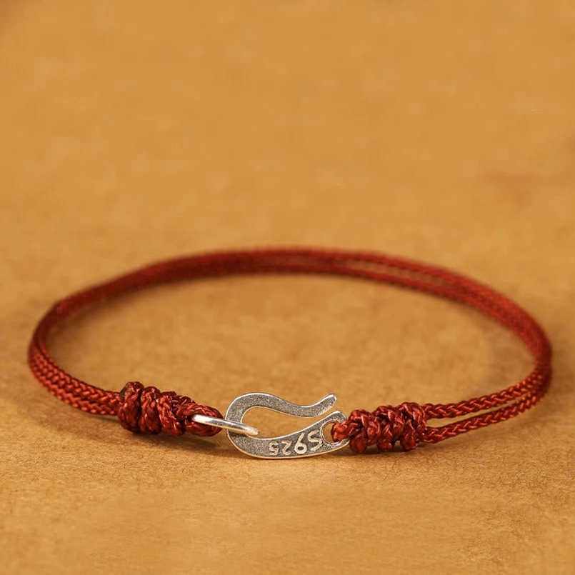 Red string bracelet with 925 silver hook clasp adjustable fit demonstration