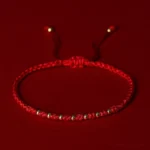 925 sterling silver gold plated beads red string protection bracelet overhead view