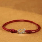 925 sterling silver red string bracelet with hook clasp flat lay front view