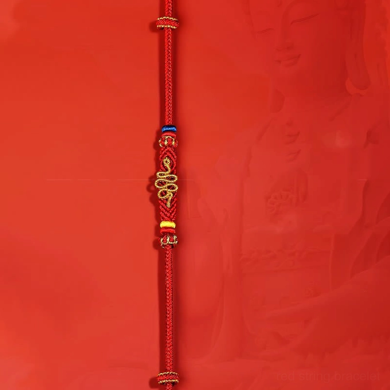 Red braided protection bracelet with central gold snake charm and multicolor accent beads, front vertical view