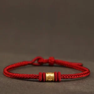 Red string Tibetan 999 gold Om Mani Padme Hum luck protection bracelet front view