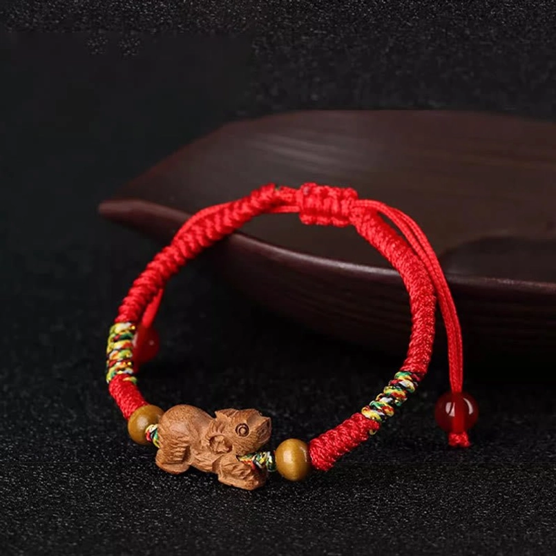 Red string zodiac bracelet red agate pendant detail