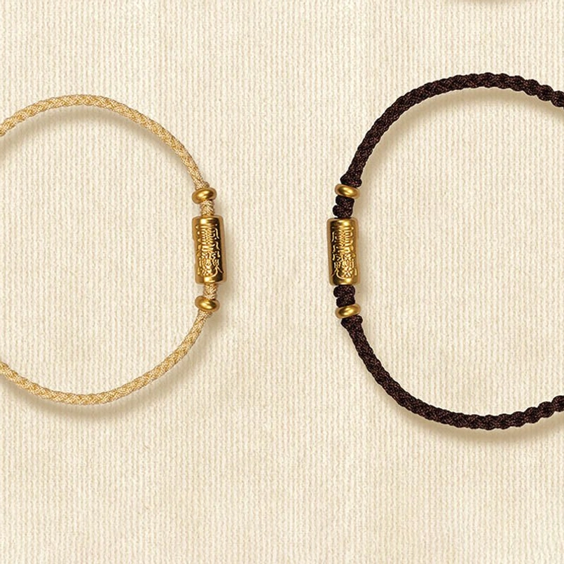 Red braided bracelet with carved 999 gold charm - fate connection symbol