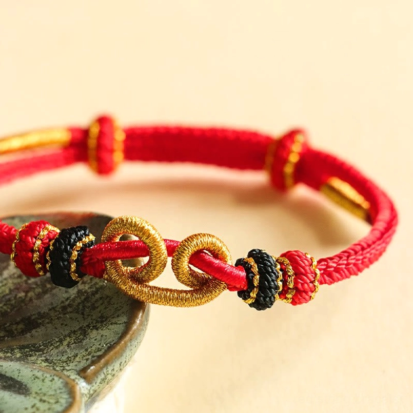 Red Protective Braided Bracelet With Golden Double Loop Details